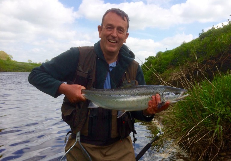 Contact Andrew Overend with salmon in hand